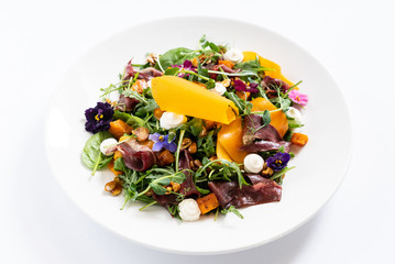 tasty salad with pumpkin