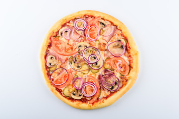  pizza with ham cheese tomatoes pickles mushrooms and onions on a light background