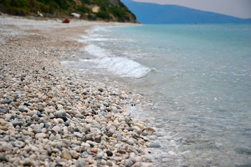 Fototapeta na wymiar Pebble beach of the Ionian sea, Albania.
