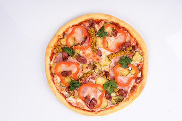 pizza with ham cheese pickles mustard hunting sausages and red bell pepper on a white background