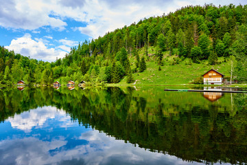 Fototapeta premium Traditional mountain house in Austrian Alps near of lake Sommersberg