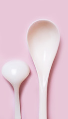 vector illustration spoon in front of the pink  background