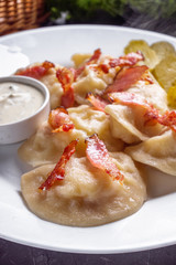 traditional Ukrainian dish of dumplings with sour cream