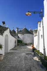 Obraz premium traditional Trulli houses in Alberobello city, Apulia, Italy