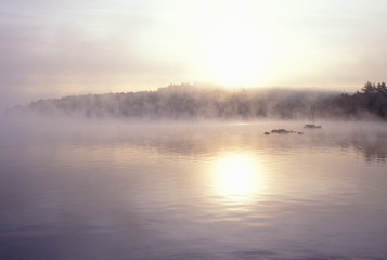 Obraz na płótnie Canvas Lake Shrouded in Autumn Morning Fog, Squam Lake, New Hampshire