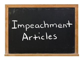 Obraz premium Impeachment articles written in white chalk on a black chalkboard isolated on white