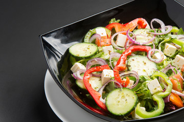 closeup of greek salad healthy vegetarian food.