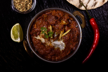 indian chicken tikka massala on slate