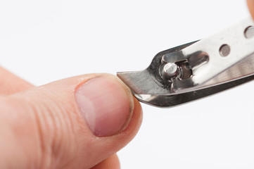 Nail care. Closeup of hands getting manicure isolated on white background. Copy space.