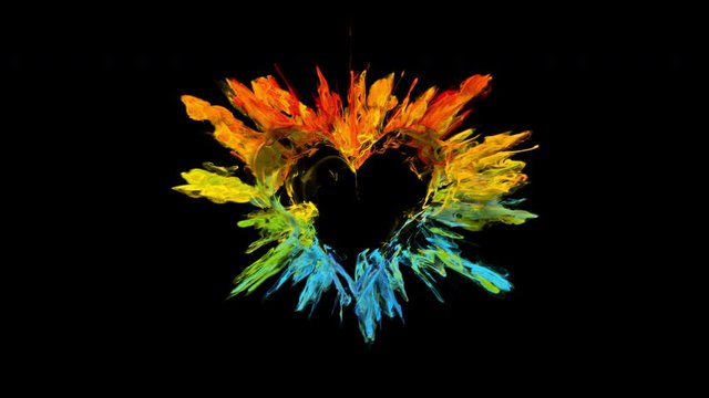 Iridescent Valentine's Day color burst forming a heart shaped hole. Vivid rainbow colored smoke powder explosion. Romantic colorful lovely ink logo and copy space. Isolated on black alpha copyspace