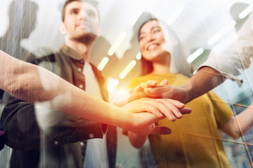 Business person put their hands together. Concept of teamwork, agreement and partnership. Double...