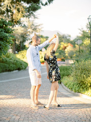 Smiling beautiful couple dating outdoors. Love. Summer in Italy