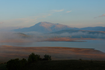 Morning mist on Cetina River reservoir in Croatia
