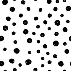 Dot doodles seamless pattern. Hand drawn circles texture. Dots background.