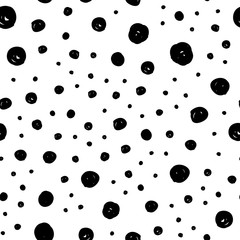 Dot doodles seamless pattern. Hand drawn circles texture. Dots background.