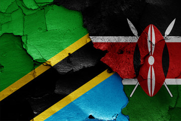 flags of Tanzania and Kenya painted on cracked wall