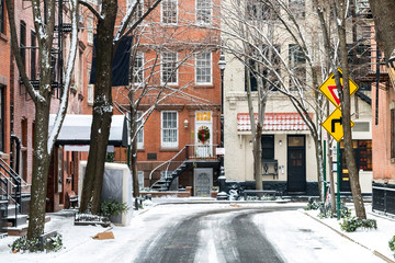 Snowy winter scene on Commerce Street in the Greenwich Village neighborhood of Manhattan in New...