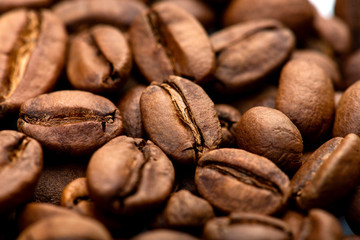 Coffee beans close-up background. Fresh roasted