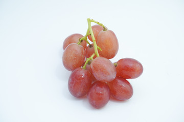 Fresh bunch of grapes on white background.