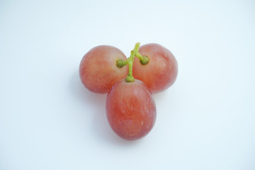Fresh bunch of grapes on white background.