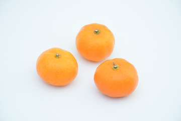 Fresh mandarin orange on white background.