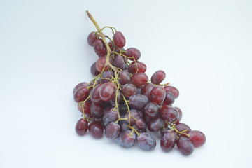 Fresh grapes on white background.