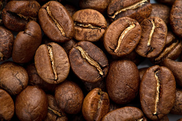 Coffee beans close-up background. Fresh roasted