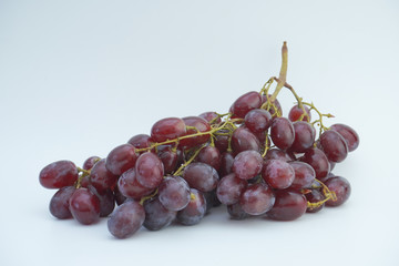 Fresh grapes on white background.