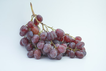 Fresh grapes on white background.