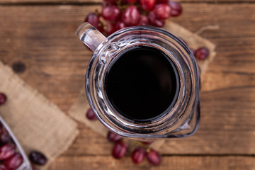 Red Grape Juice (selective focus; detailed close-up shot)