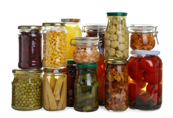 Fototapeta na wymiar Glass jars of different pickled vegetables isolated on white