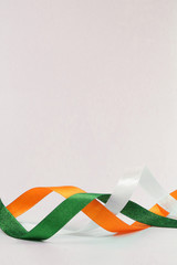 Orange white and green ribbon Isolated over white background.