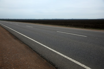 Fototapeta premium Beautiful view of asphalt highway without transport