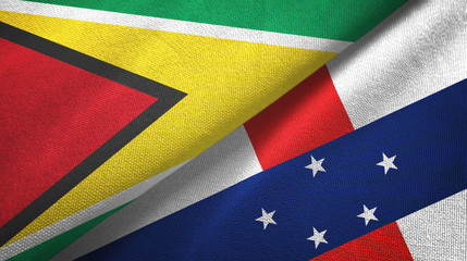 Guyana and Netherlands Antilles two flags textile cloth, fabric texture
