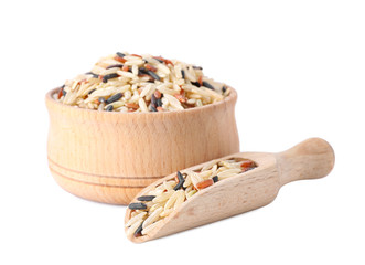 Bowl and scoop with mix of brown rice isolated on white