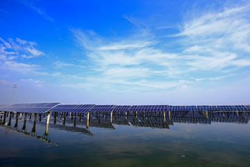 Fototapeta na wymiar Solar panels on the water