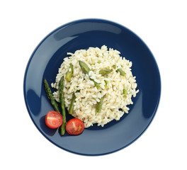 Delicious risotto with asparagus isolated on white, top view
