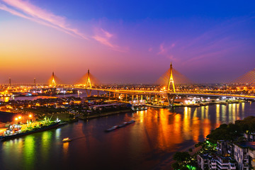 Fototapeta na wymiar Bhumibol suspension bridge over Chao Phraya River with sunrise in Bangkok city, Thailand