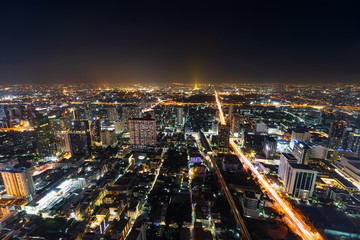 Bangkok city downtown and road traffic at night of Thailand , Cityscape