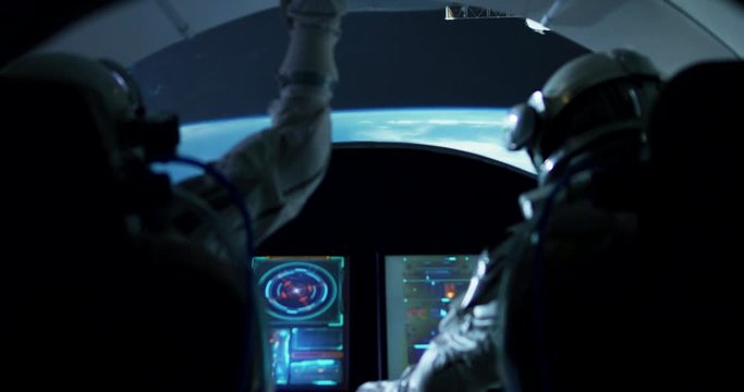Spaceship with astronauts orbiting around planet