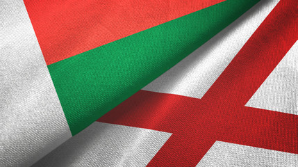 Madagascar and Northern Ireland two flags textile cloth, fabric texture