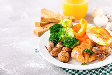 Healthy lunch - chicken fillet, mushrooms, broccoli and paprika. Selective focus. Copy space