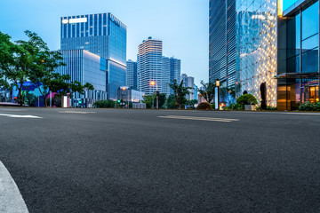 Fototapeta premium Skyline of Asphalt Pavement and Night Scenery of Shanghai Architectural Landscape