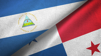 Nicaragua and Panama two flags textile cloth, fabric texture