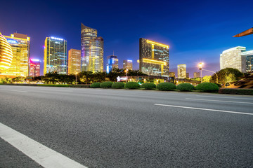Fototapeta na wymiar Skyline of Expressway Pavement and Night Scenery of Modern Architectural Landscape