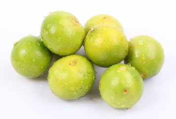 Fresh lime with water drops Isolated on white
