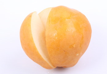 Slice fresh pear on a white background