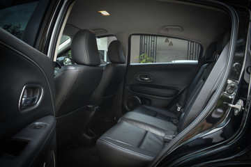 Plakat black leather of back seat interior inside modern vehicle car automobile