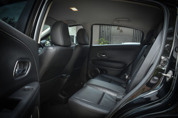 black leather of back seat interior inside modern vehicle car automobile