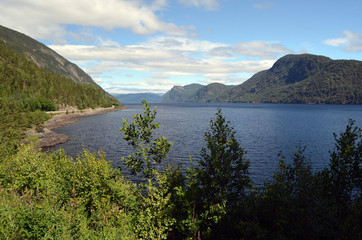 Crystal clear water of Lake Tinnsja (Tinn, Tinnsjo or Tinnsjoen) in Telemark County, Norway, one of the largest lakes in Norway, and one of the deepest in Europe